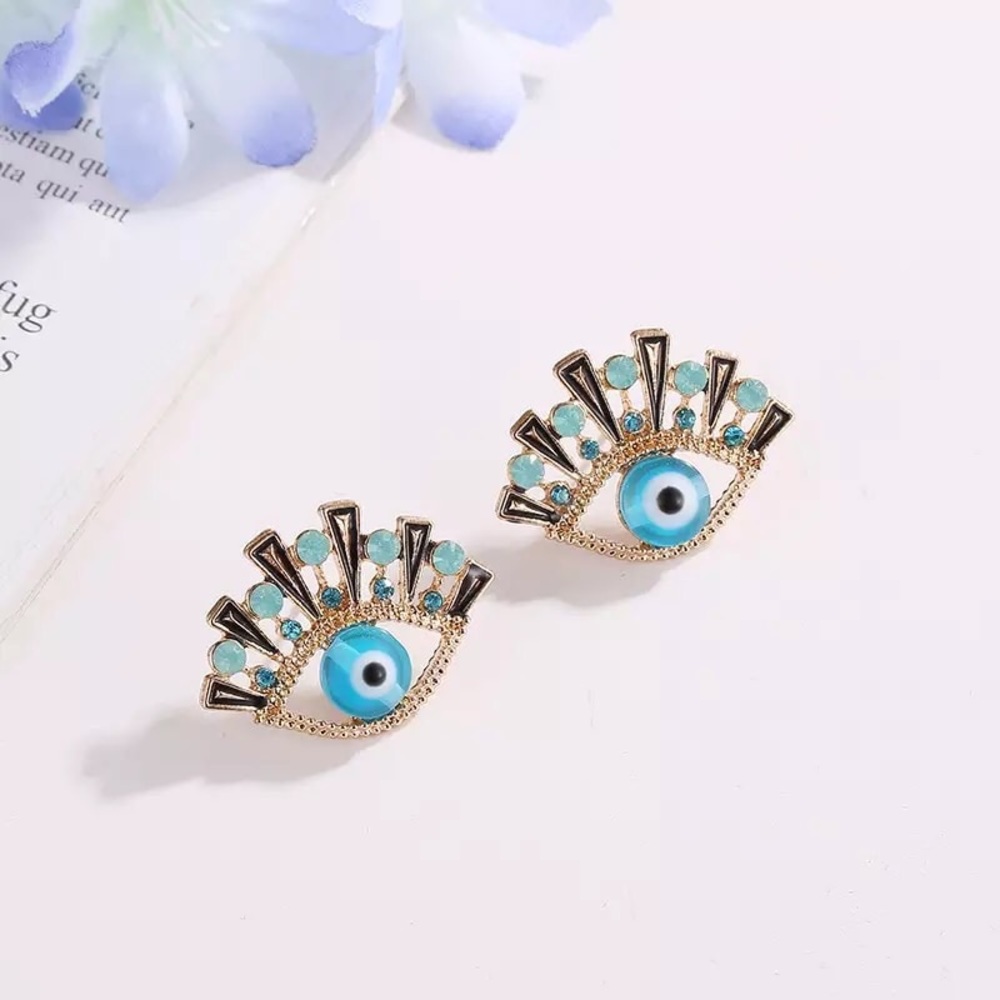 Only ships with $15 orders. Blue Eye Stud Earrings